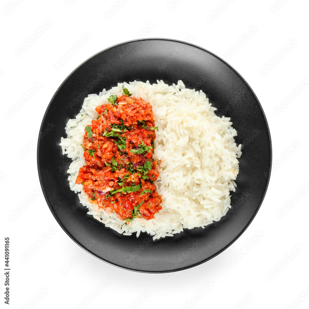 Plate with tasty chili con carne and rice on white background Plate with tasty chili con carne and rice on white background