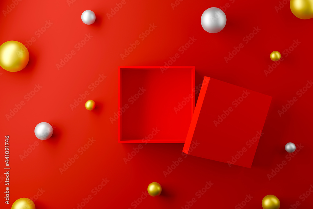 Red box open on red background with sphere ball silver and gold color