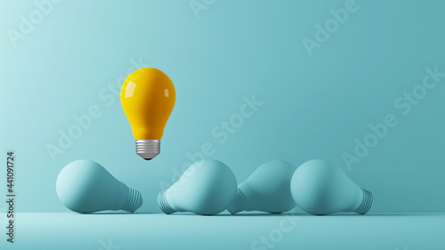 Light bulb yellow floating outstanding among lightbulb light blue on background. Concept of creative idea and innovation, Think different, Individual and standing out from the crowd. 3d illustration photo