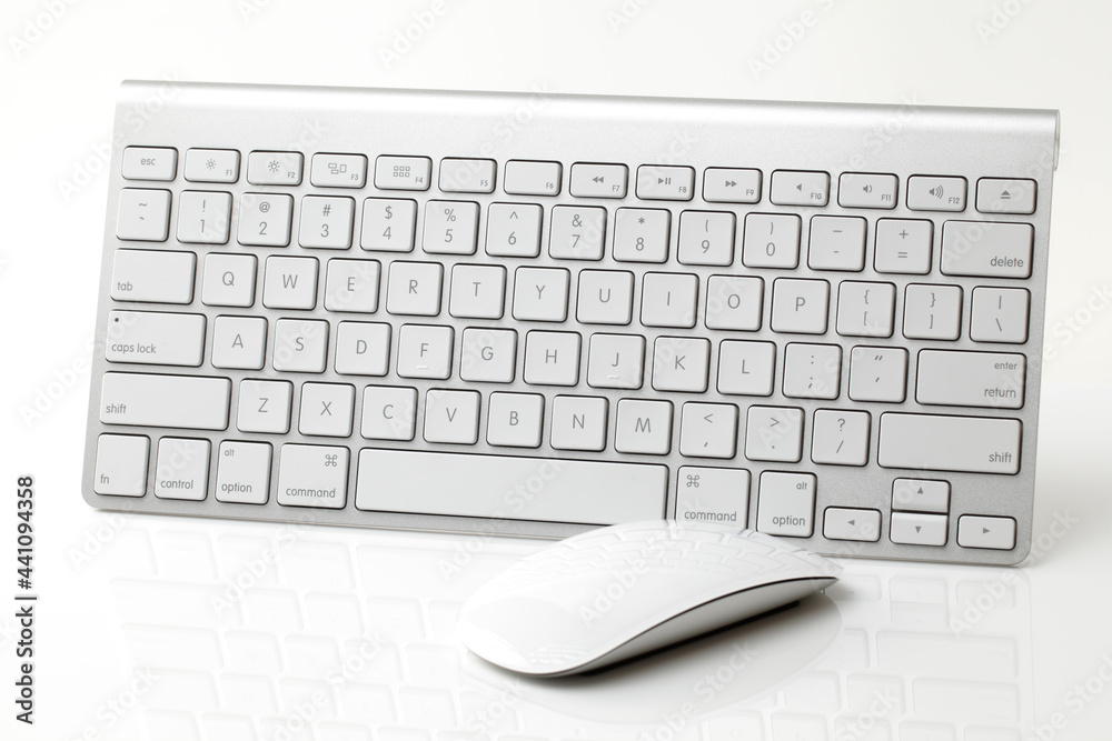 White computer mouse keyboard on white background White computer mouse keyboard on white background