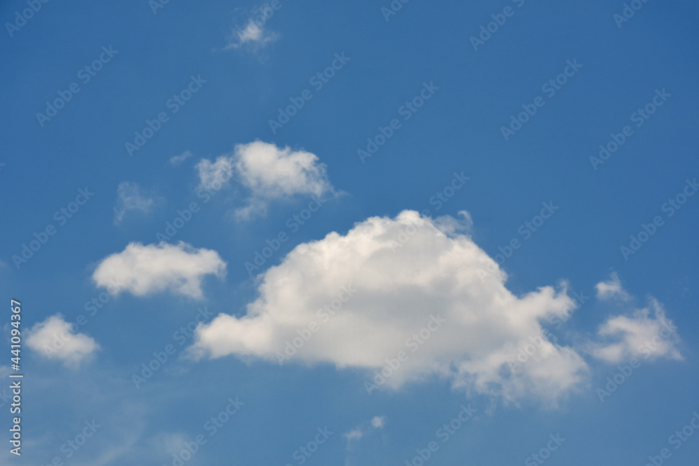Beautiful cumulus clouds against the blue daytime sky. Beautiful cumulus clouds against the blue daytime sky.