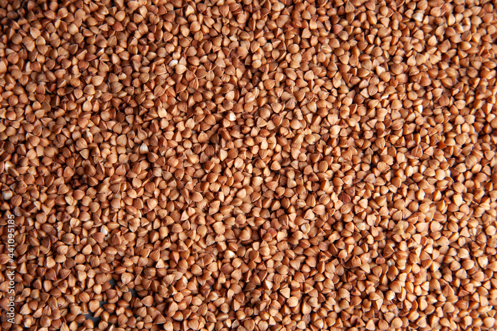 Dry buckwheat groats background top view Dry buckwheat groats background top view