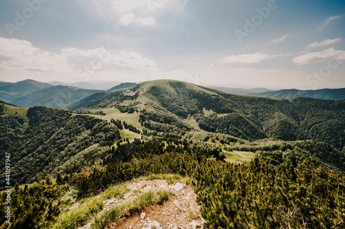 Ploska hill with mountain hut from Borisov, Big Fatra mountains, Slovakia. Hiking summer Slovakia landscape. photo