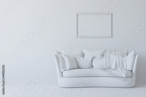 White room with sofa and pi...