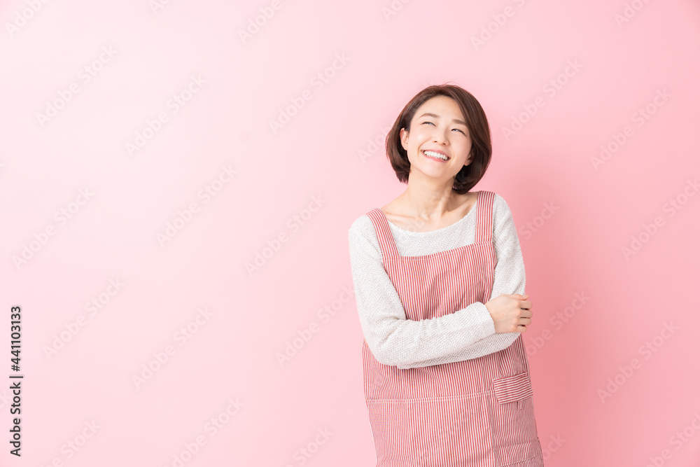 Fototapeta premium エプロン姿の女性