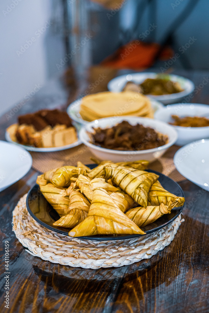 Ketupat palas with all traditional Malay Food and cookies during Ramadan and Eid Mubarak. Hari Raya Aidilfitri.