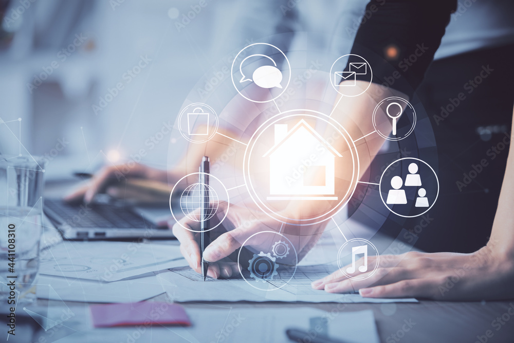 Double exposure of woman hands typing on computer and buildings drawing. Smart-city concept.