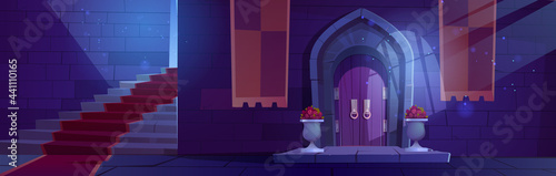 Medieval night castle interior, wooden arched door with potted flowers, stone stairs with red carpet and brick wall, entry to palace with moonlight fall through window. Fairytale Cartoon vector scene