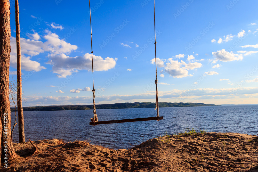 Rope swing on a shore of the Dnieper river in Ukraine