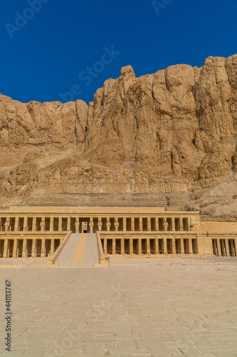 Vertical side view of the Mortuary Temple of Hatshepsut near Luxor  Egypt in sunlight