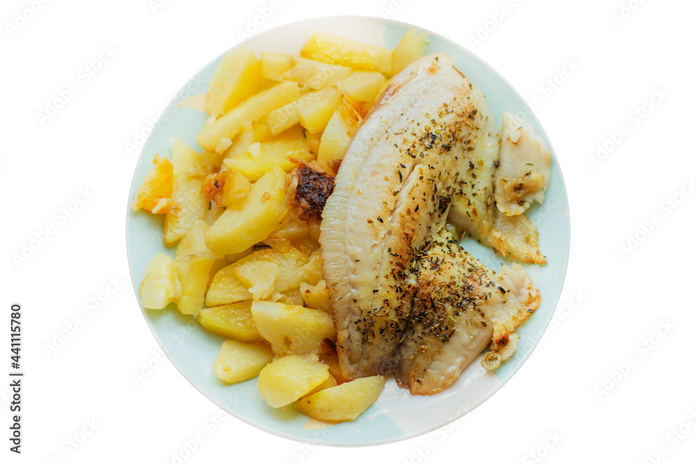 Fried fish in oil with herbs and spices with homemade fried potato. Simple, homemade food on light background. Fried fish in oil with herbs and spices with homemade fried potato. Simple, homemade food on light background.