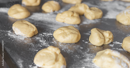  Dough makes fresh bread on the kitchen table.