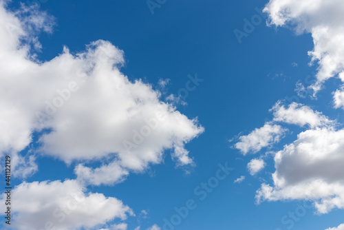 Fototapeta Naklejka Na Ścianę i Meble -  Blue sky background with white clouds.Cloudscape. Sunny day. Cumulus cloud.