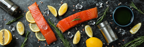 Concept of cooking salmon on black smokey background