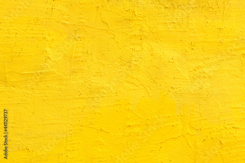 Yellow cement wall as background