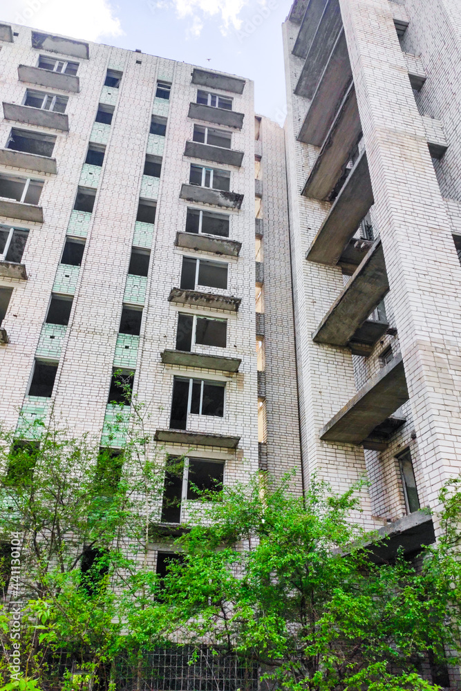 Abandoned high-rise buildings, city. Clean quarts and buildings without windows or doors.