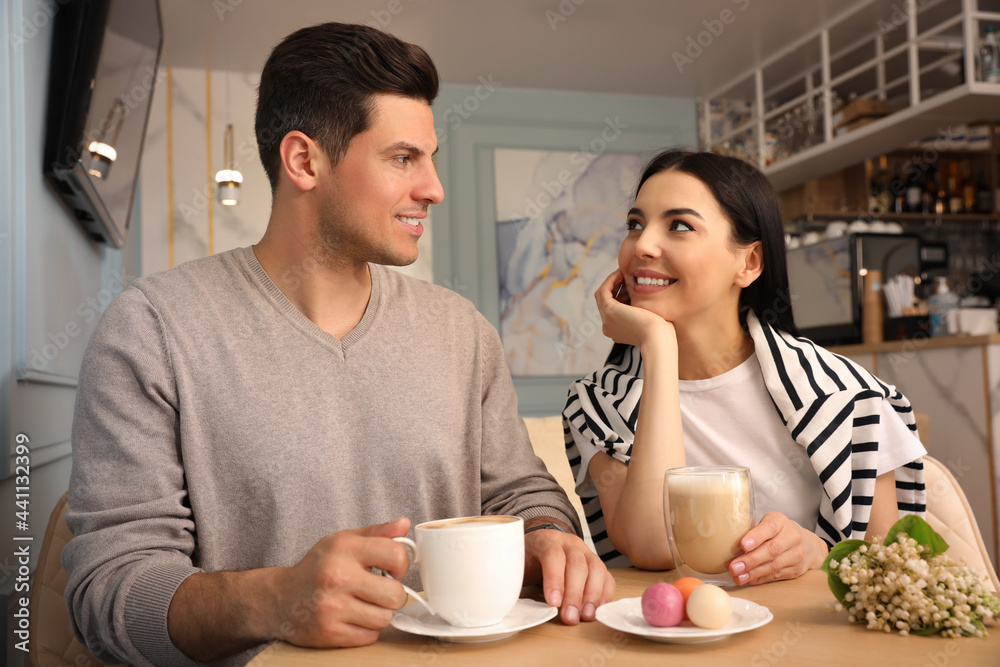 Lovely couple on date at cafe in morning Lovely couple on date at cafe in morning
