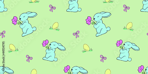 Vector seamless pattern with cute blue rabbit and eggs on green background.