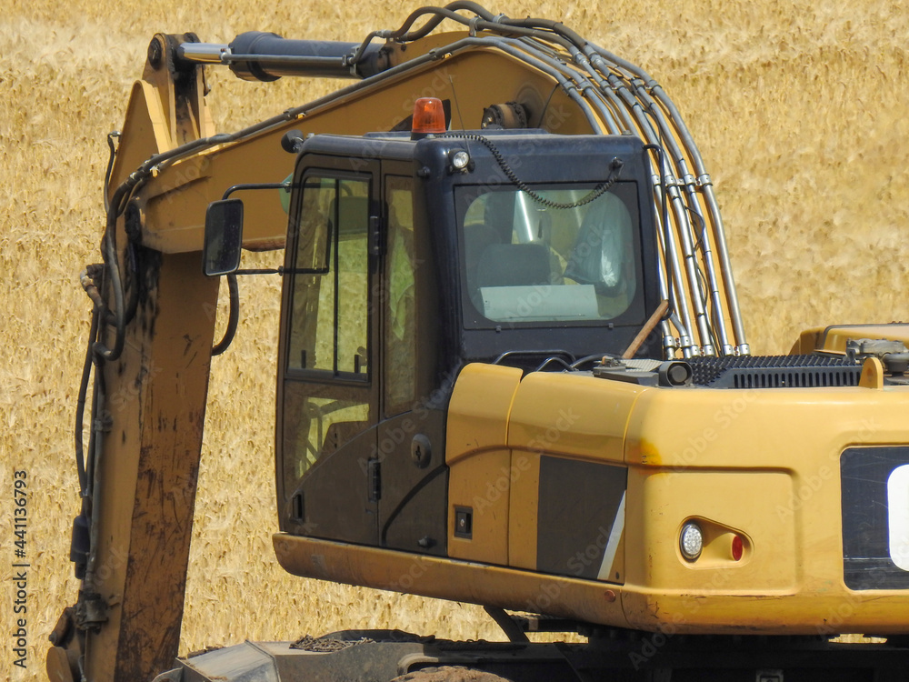 the tractor works in the field