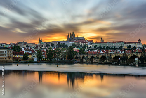 The famous Prague castle with the Charles bridge during a beautiful sunset.