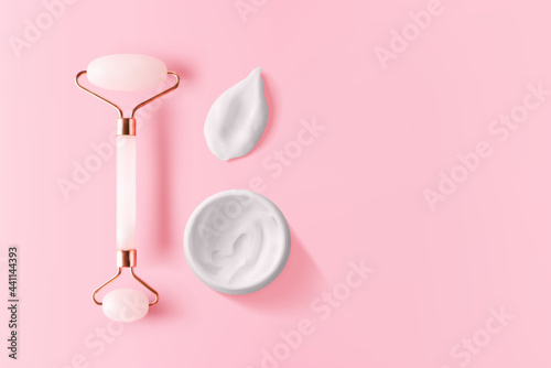 Quartz facial massager, moisturizer cream smear and jar on pink background with copy space, top view. Trendy skin care facial massager tools flat lay composition 3d vector realistic illustration