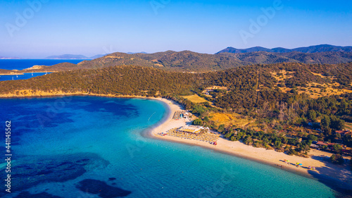 Fototapeta Naklejka Na Ścianę i Meble -  Aerial shot of Tuerredda beach on a beautiful day, Sardinia, Italy. Aerial drone view of Tuerredda in Sardegna. Famous Tuerredda beach on the south of Sardinia near Teulada. Sardinia, Italy.
