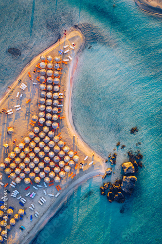 Aerial drone shot of beautiful turquoise beach with pink sand Elafonissi, Crete, Greece. Best beaches of Mediterranean, Elafonissi beach, Crete, Greece. Famous Elafonisi beach on Greece island, Crete.
