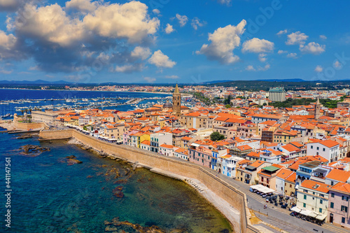 Papier peint Aerial view over Alghero old town, cityscape Alghero view on a beautiful day with harbor and open sea in view
