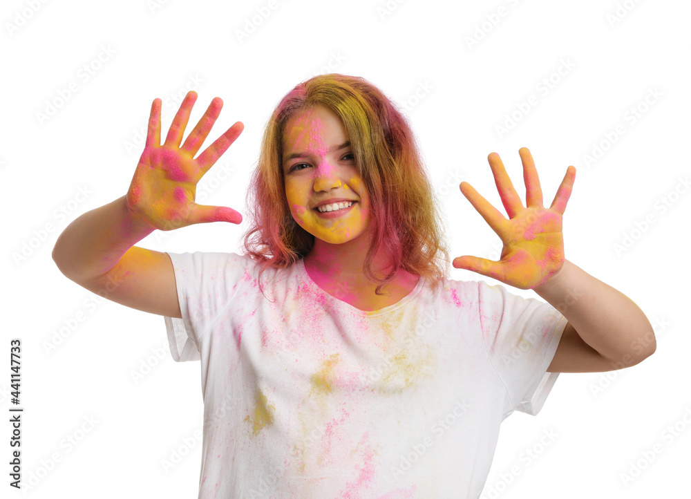 Teen girl covered with colorful powder dyes on white background. Holi festival celebration Teen girl covered with colorful powder dyes on white background. Holi festival celebration