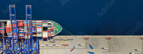 Billede på lærred Aerial top down ultra wide photo of industrial container ship loading  - unloadi