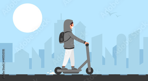 woman rides around the city on an electric scooter. convenient mode of transport, comfortable ride, summer sports
