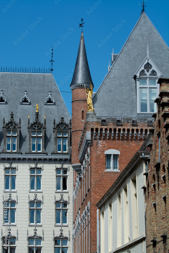 27 April 2021, Bruges, Belgium, walking on medieval Bruges streets in sunny day, travel destination