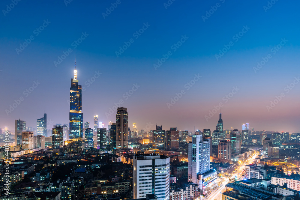 Obraz premium Night view of Zifeng Building and city skyline in Nanjing, Jiangsu, China
