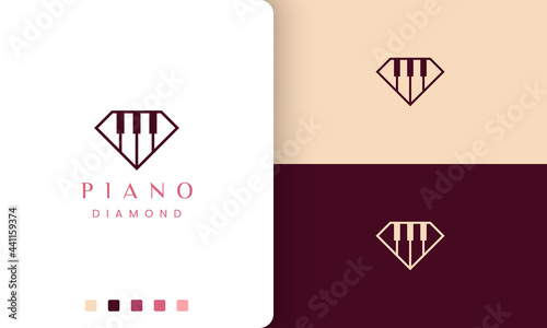 simple and modern piano school logo or icon in diamond shape