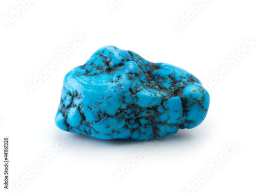 Raw turquoise stone isolated on white photo