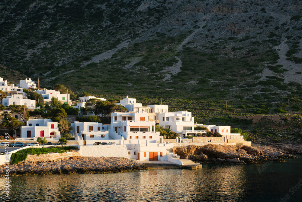 Kamares town with traditional white houses on Sifnos island on sunset. Greece