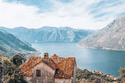 Stoliv, Montenegro - 2018: Ruined house with background view to Boka Kotorska bay