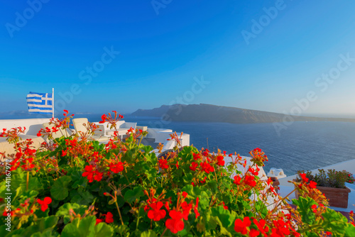 Stunning cupolas with the Caldera (volcano) in the distance in the Greek island of Santorini