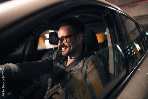 Картината върху платно Attractive man driving car