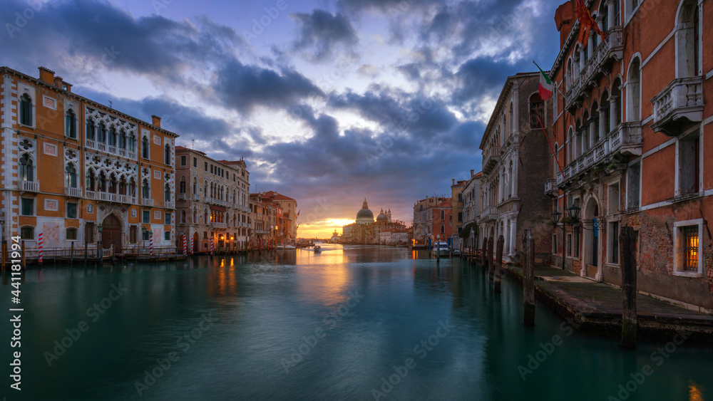 Grand Canal at sunrise in Venice, Italy. Sunrise view of Venice Grand Canal. Architecture and landmarks of Venice. Venice postcard