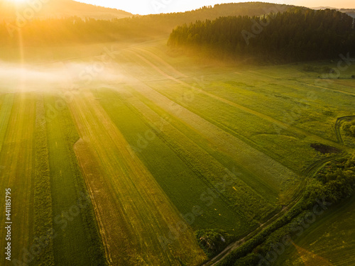 Sunrise Over Agriculture Fields. Aerial Drone View
