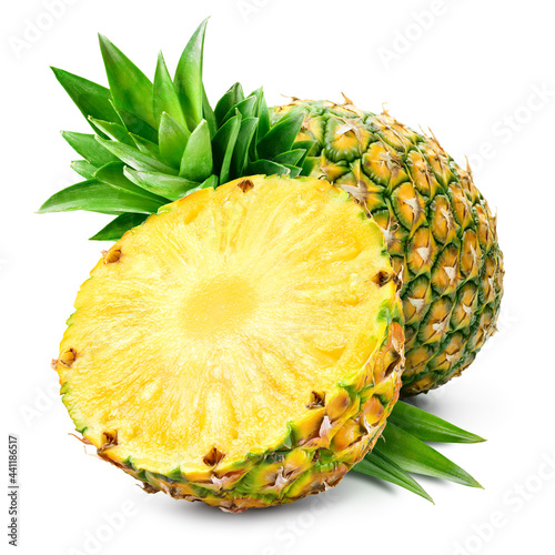 Pineapple isolated. Whole pineapple with half and leaves. Whole and cut half pineapple on white. Full depth of field.