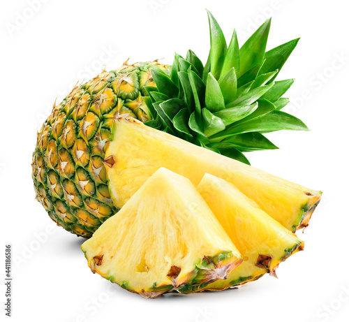 Cut pineapple isolated. Whole pineapple with slice, piece and leaves. Whole and cut pineapple on white. Full depth of field.