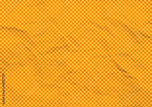 Yellow crumpled diagonal tartan paper background.