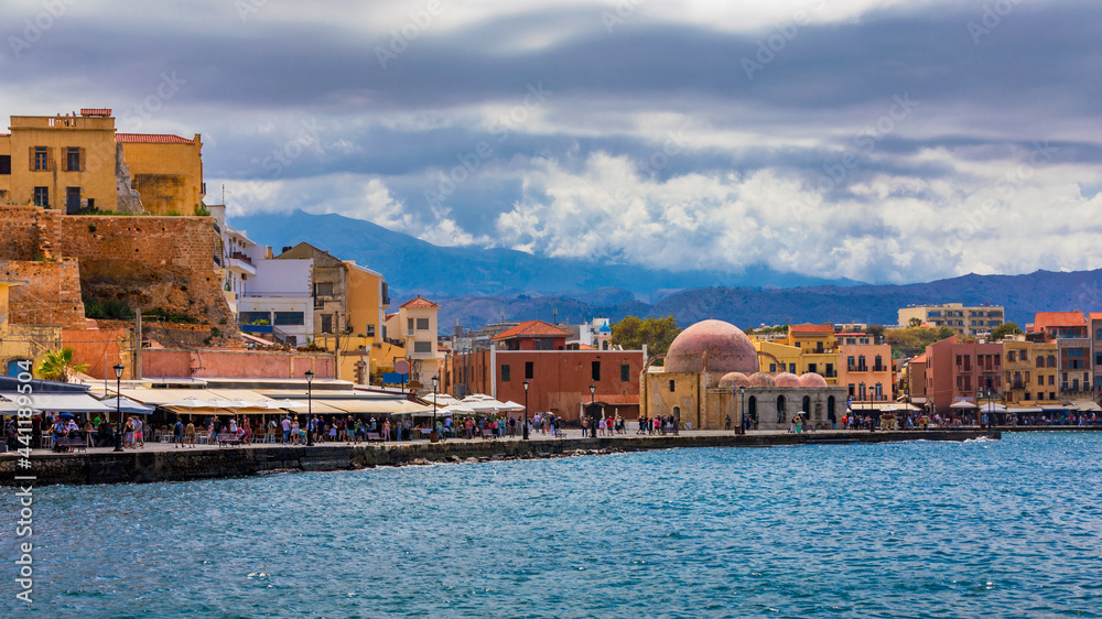 Picturesque old port of Chania. Landmarks of Crete island. Greece. Bay of Chania at sunny summer day, Crete Greece. View of the old port of Chania, Crete, Greece. The port of chania, or Hania.