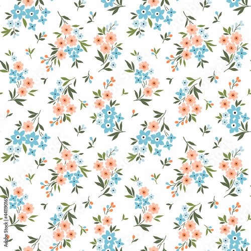 Seamless floral pattern. Ditsies background of small coral and pale blue flowers. Small-scale flowers scattered over a white background. Stock vector for printing on surfaces and web design.