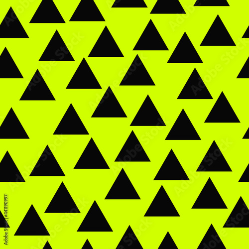 Yellow background and black triangles. Vector seamless triangle pattern.