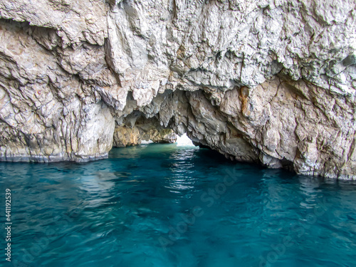 Sea grotto in a white limestone rock