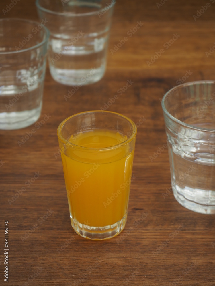 Orange juice between water Orange juice between water