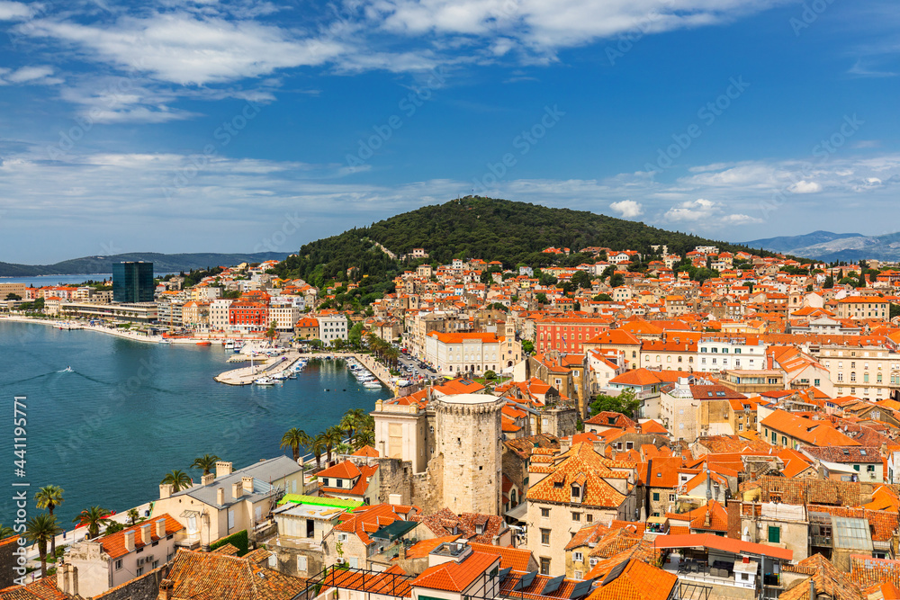 Split waterfront and Marjan hill aerial view, Dalmatia, Croatia. Panoramic summer cityscape of old medieval city Split, Croatia, Europe.  Traveling concept background.